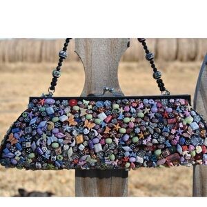 Far Nine Beaded Clutch